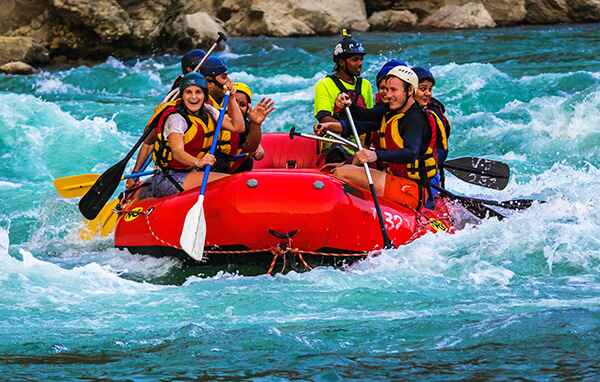 Group rafting on river
